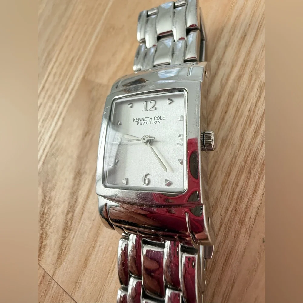 Kenneth Cole reaction ladies rectangular silver tone watch NEW BATTERY